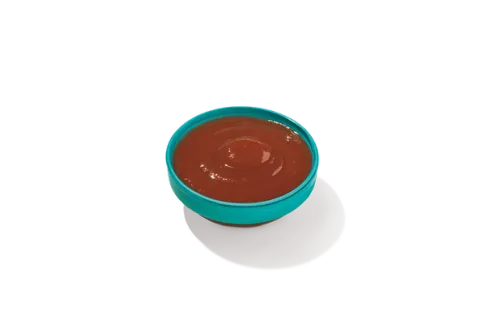 Bold BBQ Sauce in a small bowl, showcasing its rich, dark color, perfect for dipping crispy wings or chicken tenders.