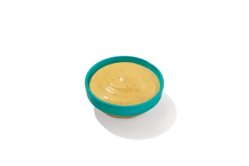 Wild Honey Mustard in a small bowl, creamy and sweet with a hint of tang, perfect for dipping chicken or fries.