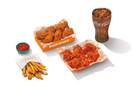 Twelve crispy Popeyes wings in a mix of classic and spicy flavors.