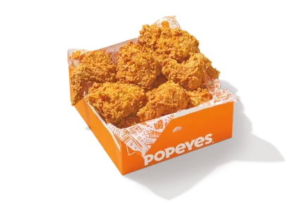 Twelve-piece Popeyes signature fried chicken in a box