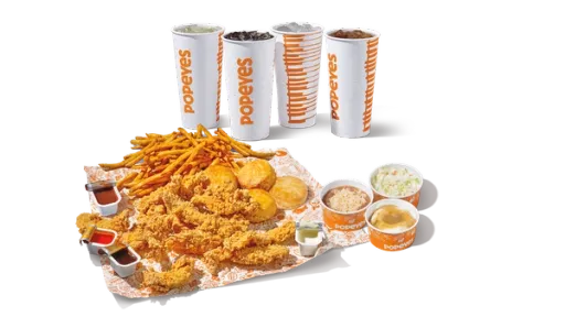 Twelve Popeyes chicken tenders with sides and biscuits.