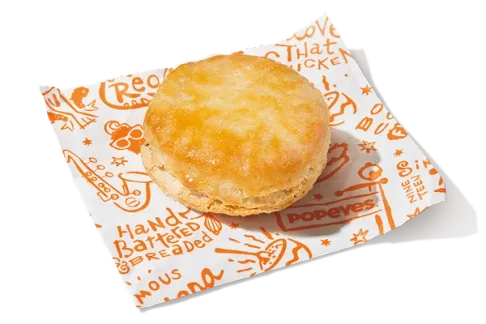 A la Carte Biscuits stacked on a plate, warm and flaky, with a golden-brown crust, perfect as a snack or side.