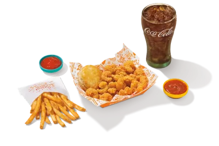 1/4 lb Popcorn Shrimp Meal showcasing a generous portion of crispy popcorn shrimp served with a side and a drink for a delightful seafood option.